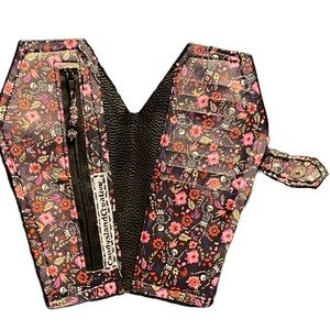 Handmade flowers and skeletons coffin wallet.